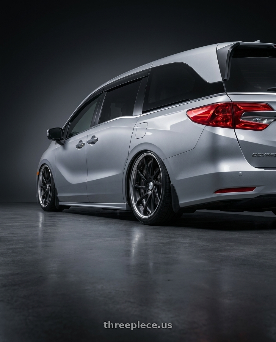 2024 Honda Odyssey with Work Gnosis Cvs 5x120 20x8.5+45 O Disk Matte Black wheels rear three quarter view slight stretch tires