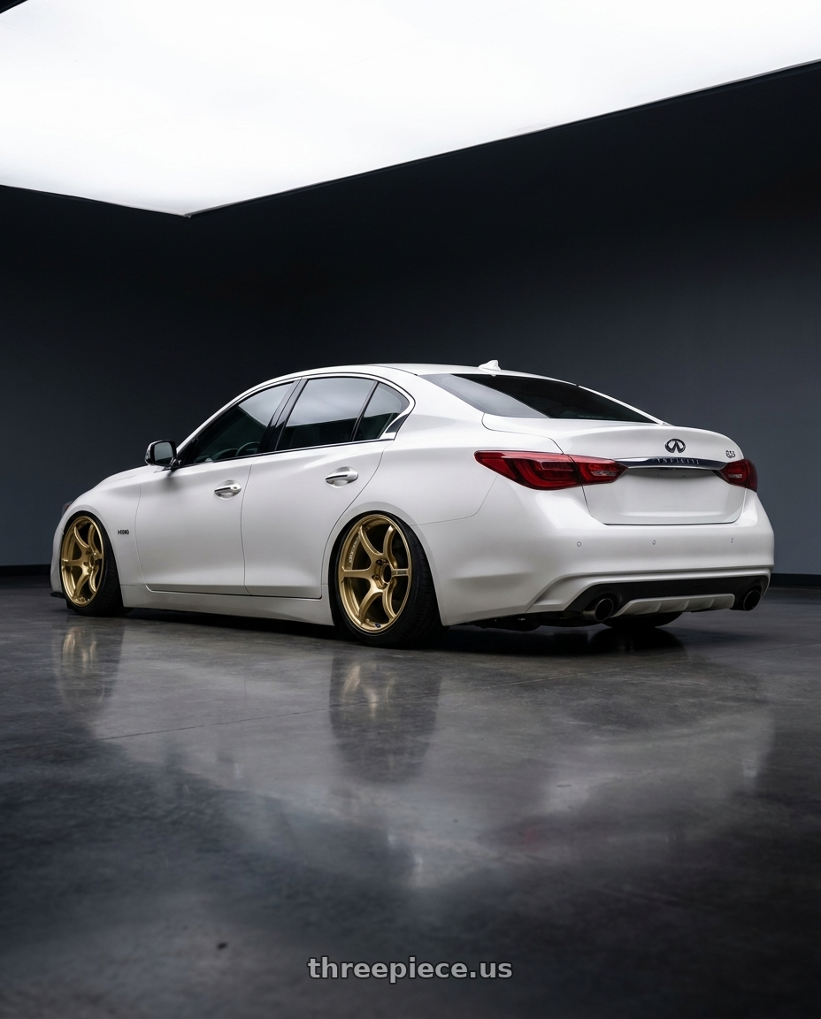 2020 Infiniti Q50 with Advan RGIII 5x114.3 19x9.5+45 Gold wheels rear three quarter view slight stretch tires