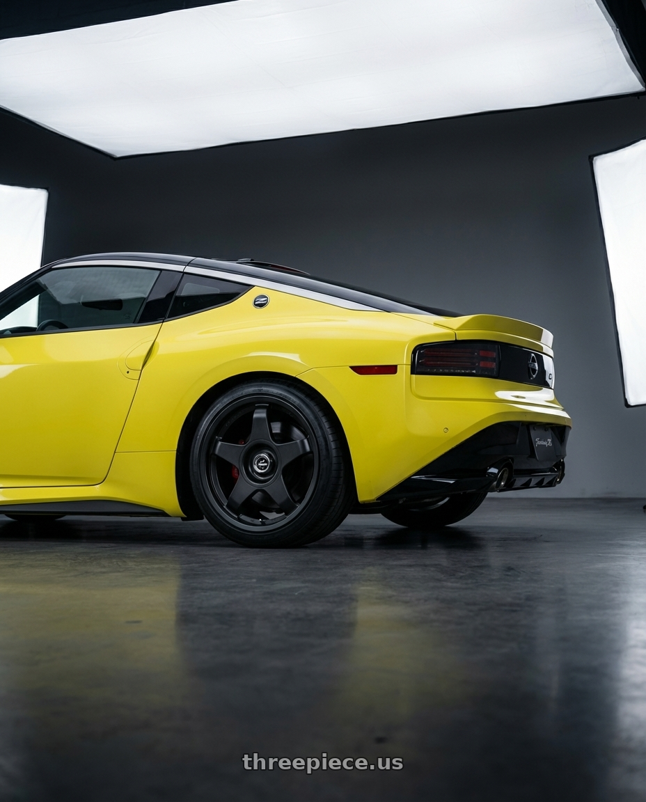 2024 Nissan Z with fifteen52 CHICANE 5x114.3 / 5x120 19x8.5 +35 ASPHALT BLACK (SATIN BLACK) wheels rear three quarter view square tires