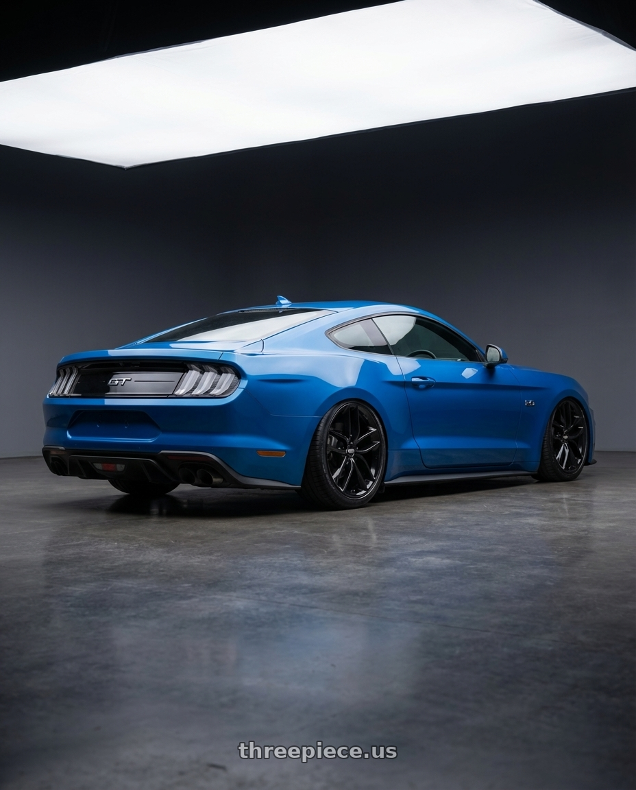 2022 Ford Mustang GT with BBS SX 5x114.3 20x9.0+42 Crystal Black wheels rear three quarter view slight stretch tires