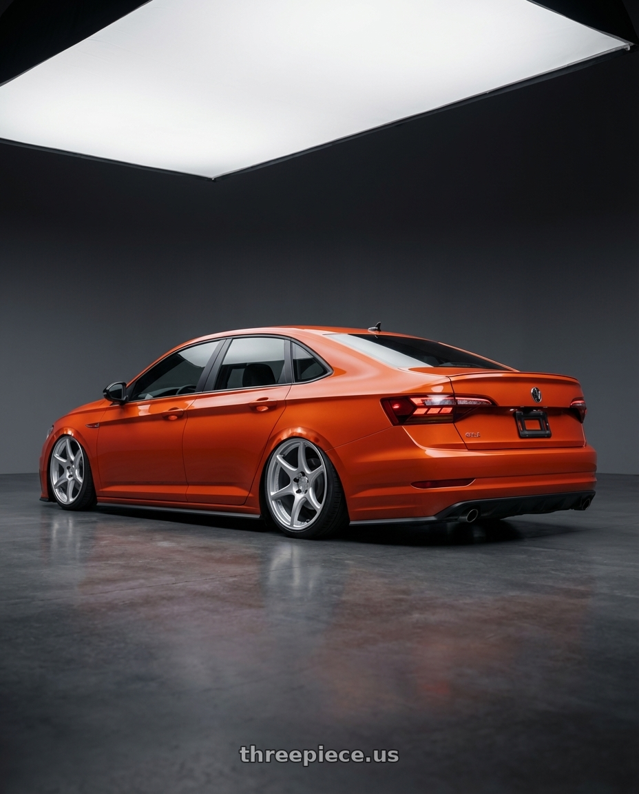 2023 Volkswagen Jetta GLI MK7 with Kansei K11S Tandem 5X112 19x9.5 22 Hyper Silver wheels rear three quarter view slight stretch tires