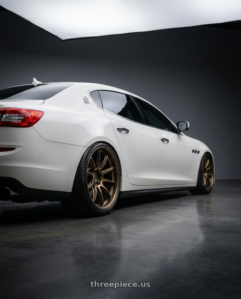 2014 maserati quattroporte gts  with Work Zr10 2P 5x114.3 20x11.0 +45 Matte Bronze wheels rear three quarter view slight stretch tires