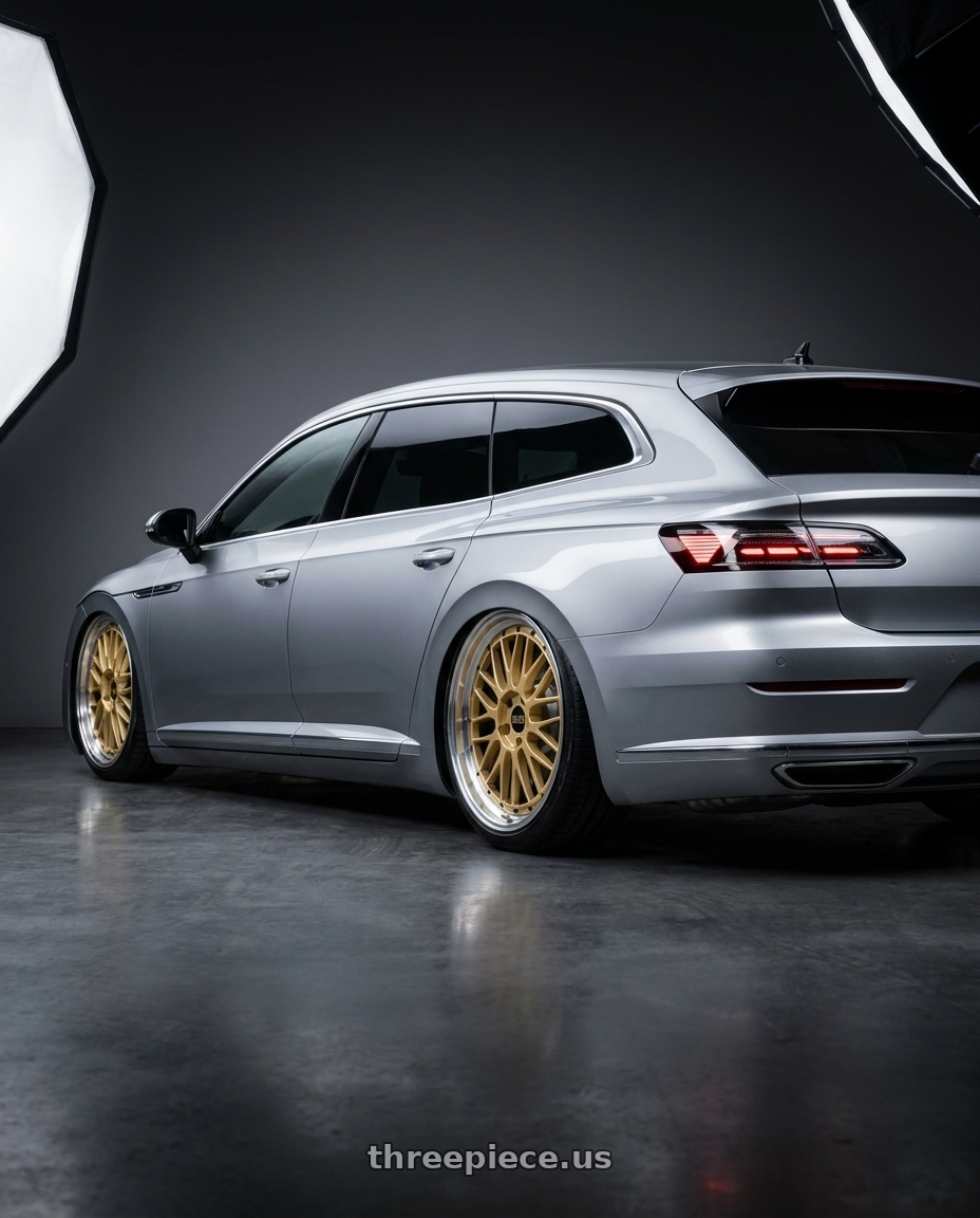 2023 Vw arteon shooting brake with BBS LM 5x112 19x9.0+42 Gold wheels rear three quarter view slight stretch tires