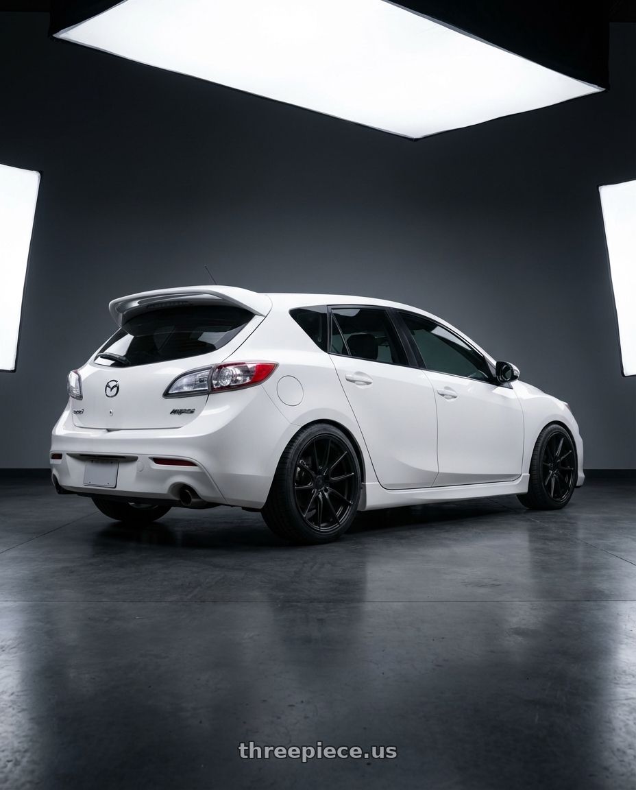 2012 Mazda Mazdaspeed3 with Niche 1PC M117 MISANO 5X114.3 18X9.5 +40 MATTE BLACK wheels rear three quarter view square tires