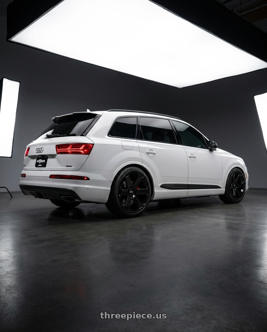 2019 Audi Q7 Prestige (22 in OE Option) with Rotiform 1PC AVS 5X112 22X10.5 +10 GLOSS BLACK wheels rear three quarter view square tires
