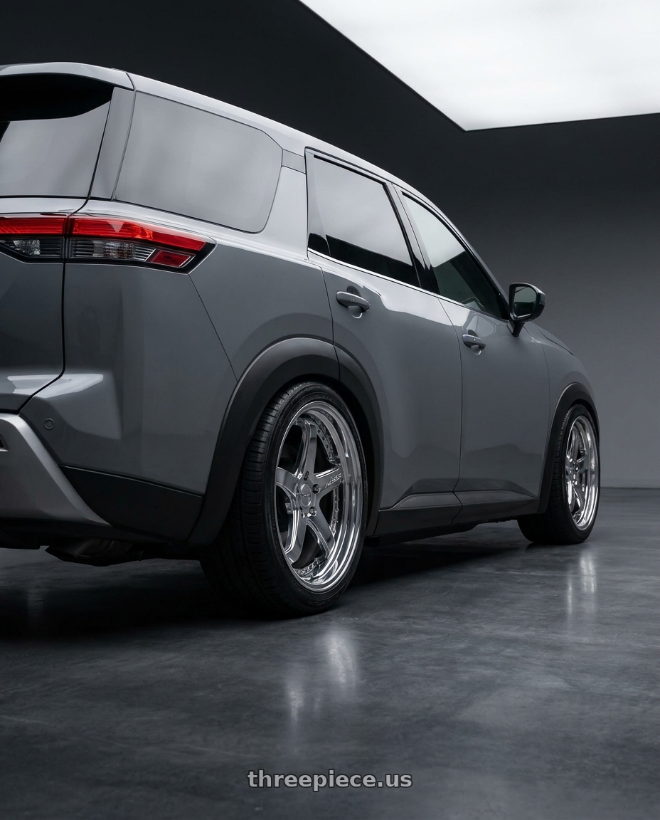 2025 nissan pathfinder s with MASSIV 926 5X114.3 22x9 +40 CHROME wheels rear three quarter view square tires