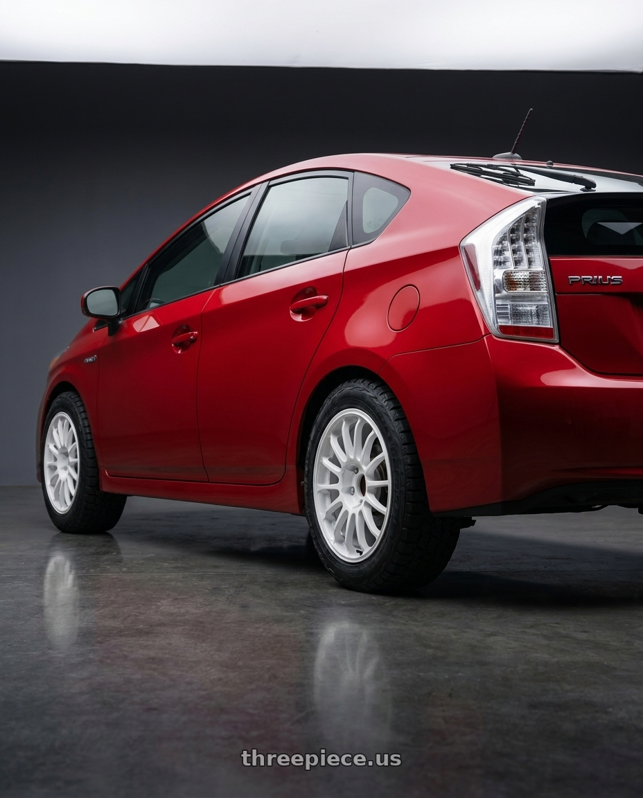 2010 Toyota Prius with Advan Racing RCx4 5x100 15x7.0 +35 RALLY WHITE wheels rear three quarter view meaty tires