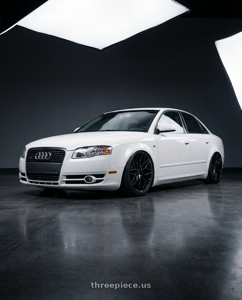 2010 Audi A4 B7 with Avant Garde Wheels M520R 5X112 19x8.5 +35 Gloss Black wheels front three quarter view stanced stance