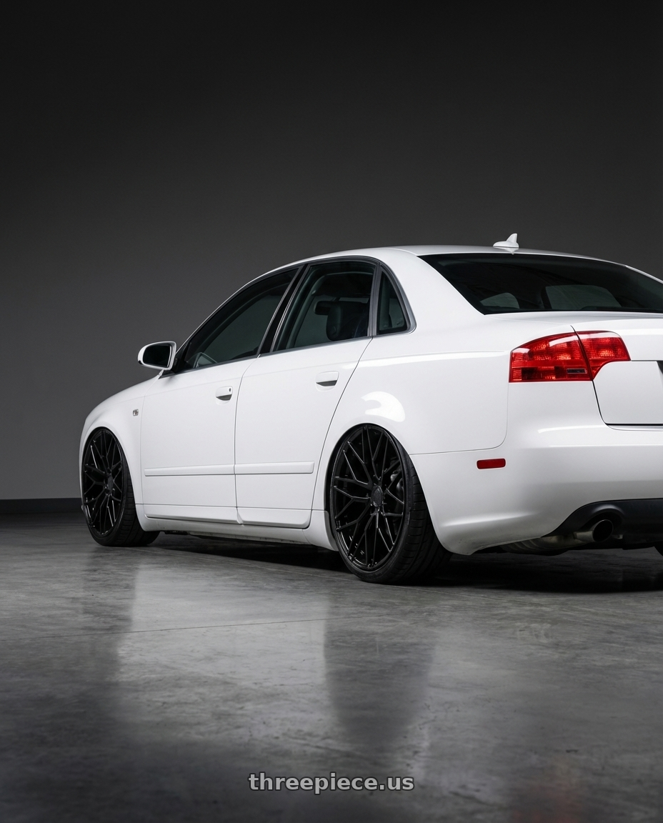 2010 Audi A4 B7 with Avant Garde Wheels M520R 5X112 19x8.5 +35 Gloss Black wheels rear three quarter view slight stretch tires