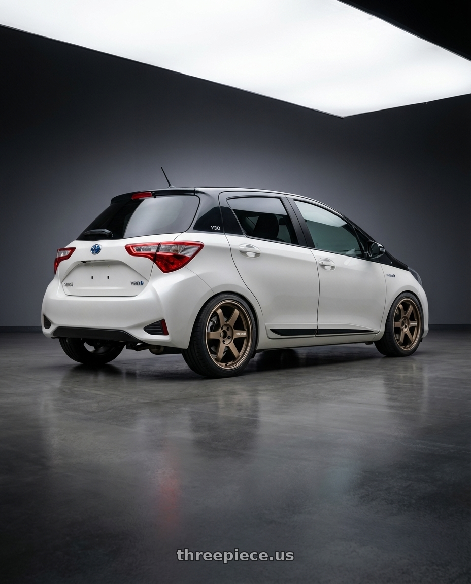 Toyota Yaris 2020 Y20 with Volk Racing TE37 ULTRA 5x114.3 19x8.5 +35 BRONZE wheels rear three quarter view square tires