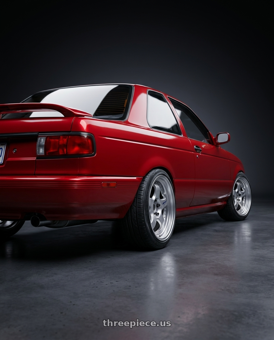 1994 nissan sentra SE with Work Meister S1 2P 4x100 15x7+38 A Disk Silver wheels rear three quarter view slight stretch tires