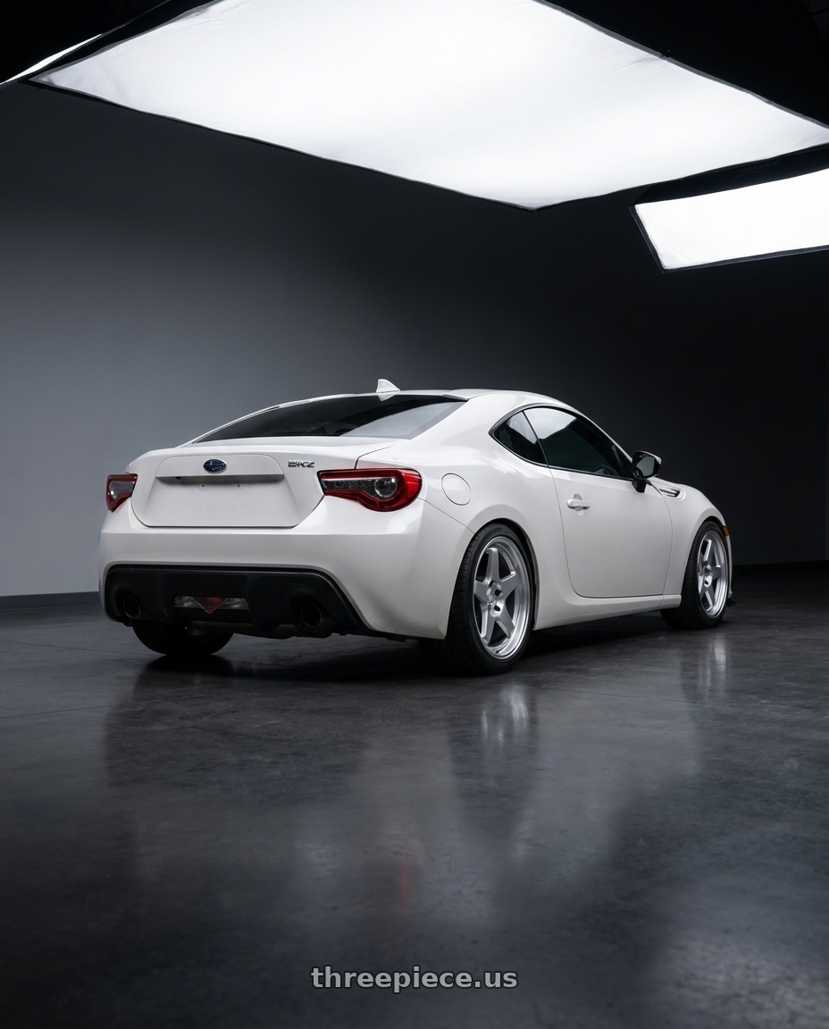 2017 Subaru BRZ Crystal pearl with Kansei K12H KNP 5X100 18x9.5 22 Hyper Silver wheels rear three quarter view square tires