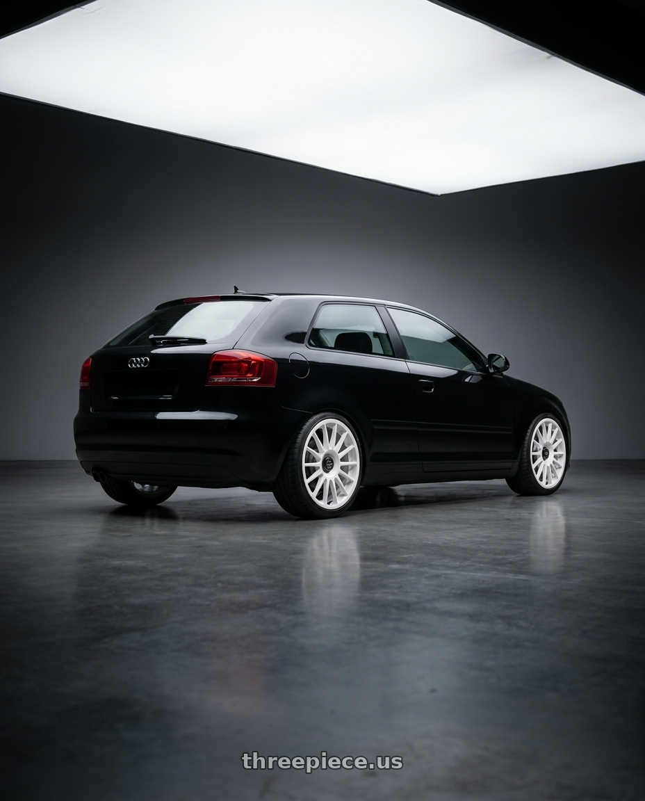 2012 Audi A3 8P with fifteen52 PODIUM 5x112 / 5x120 18x8.5 +35 RALLY WHITE (GLOSS WHITE) wheels rear three quarter view square tires