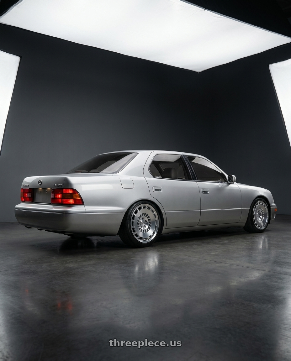 1992 lexus ls400 with Rotiform 1PC R135 CCV 5X112 18X8.5 +45 GLOSS SILVER MACHINED wheels rear three quarter view slight stretch tires
