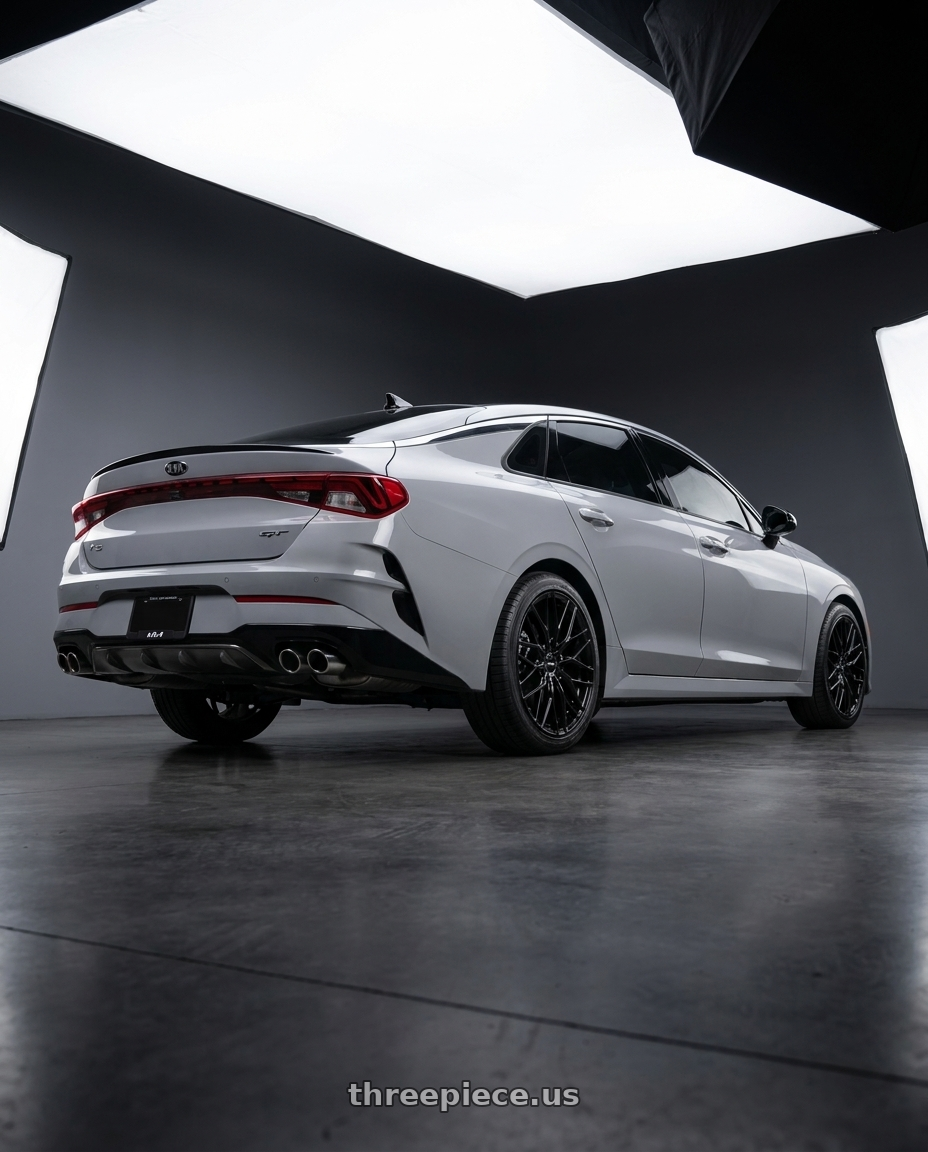 2022 Kia K5 GT wolf with RTX V20 5x114.3 19x8 +42 Gloss Black wheels rear three quarter view square tires