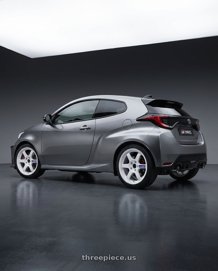 2025 Toyota GR Yaris Liquid Mercury with Volk Racing TE37 Gravel 5x114.3 15x7.0+35 White wheels rear three quarter view square tires