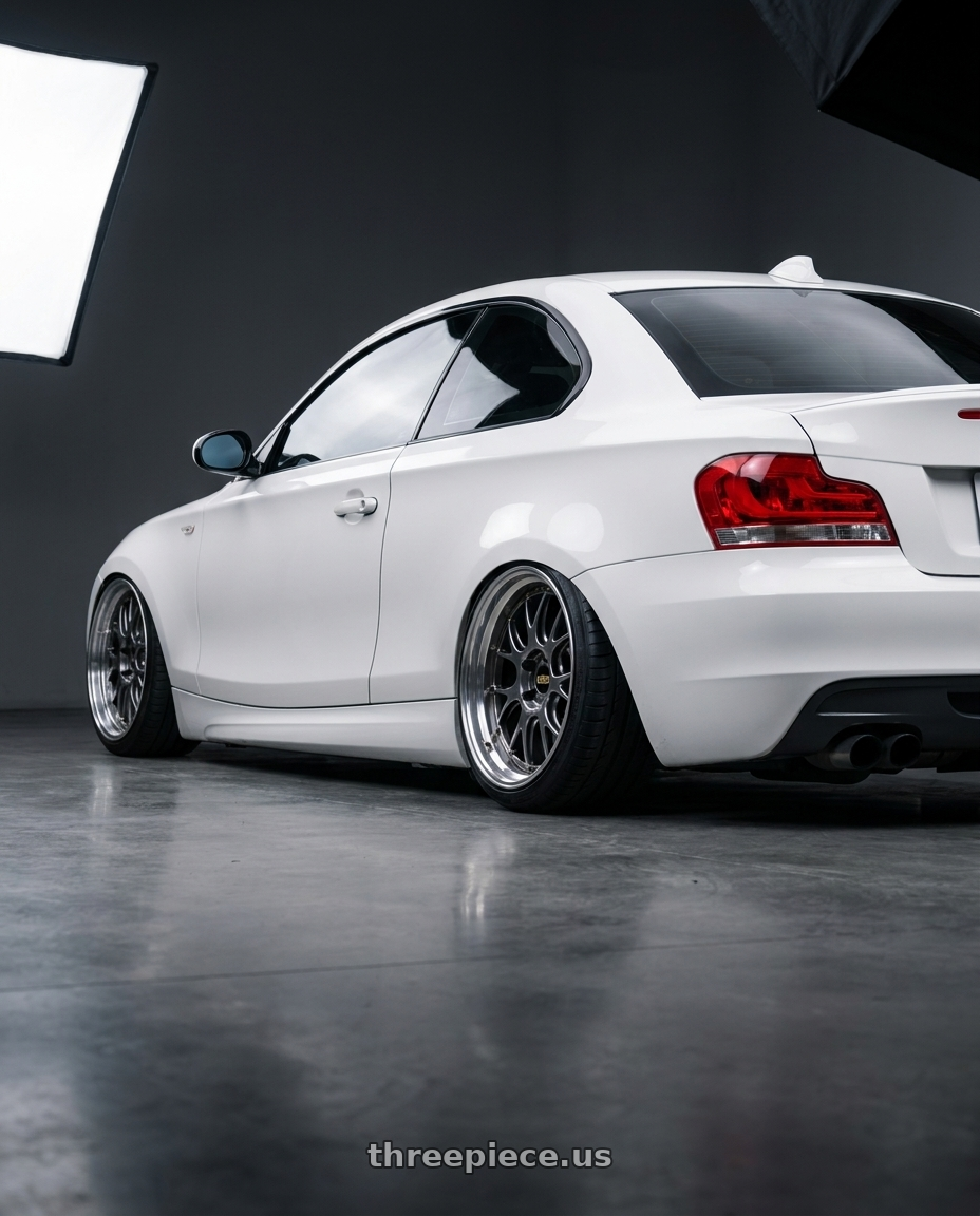 2011 bmw e82 135i with BBS LM-R 5x114.3 19x9.5+38 Diamond Black wheels rear three quarter view extreme stretch tires