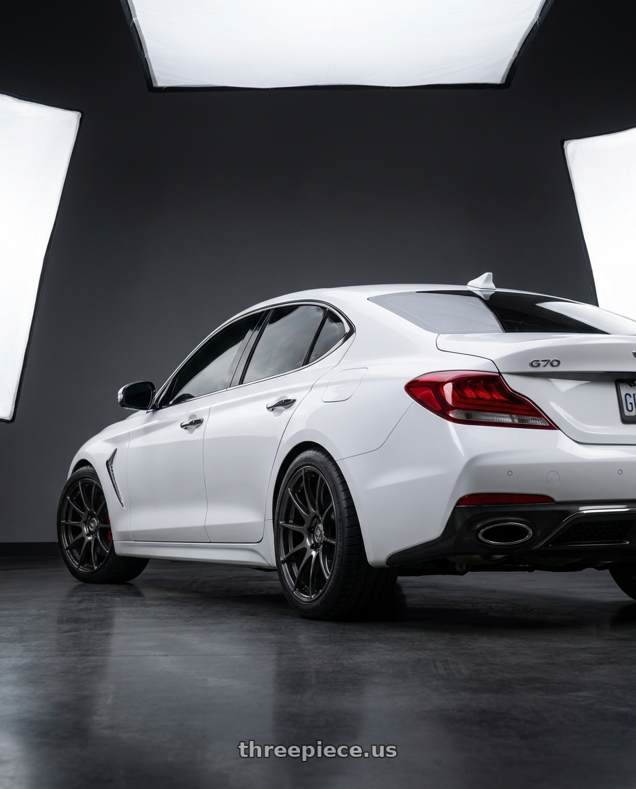 2019 Genesis G70 with Volk Racing G16 M-SPEC 5x114.3 19x9.5 +36 PRESSED BLACK CLEAR wheels rear three quarter view square tires