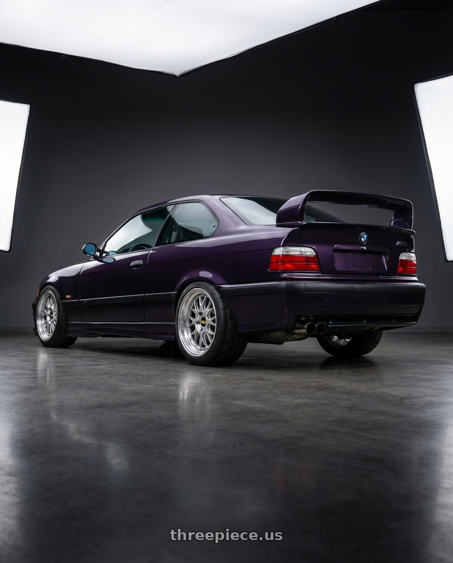 1995 BMW M3 with BBS LM-R 5x120 19x9.5+35 Diamond Silver wheels rear three quarter view meaty tires