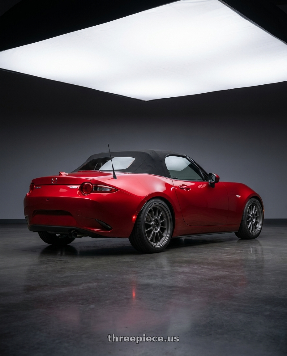 2016 Mazda Miata with Konig Hypergram 4x100 17x8+45 Matte Grey wheels rear three quarter view square tires