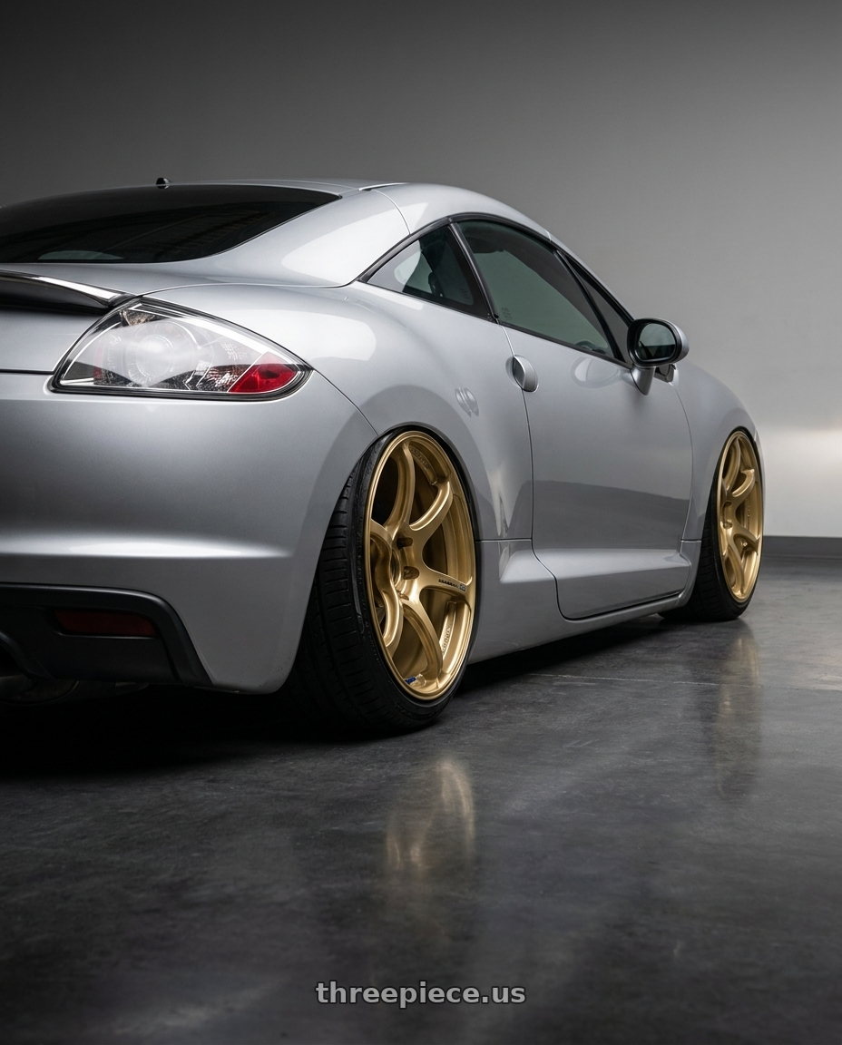 2010 Mitsubishi Eclipse with Advan RGIII 5x114.3 19x9.0+25 Gold wheels rear three quarter view slight stretch tires