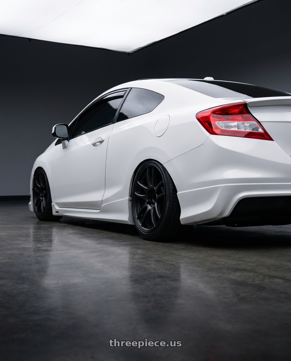 2013 Honda Civic Si Coupe with Work Emotion Cr Kiwami 4x100 15x5 +45 Matte Black wheels rear three quarter view slight stretch tires