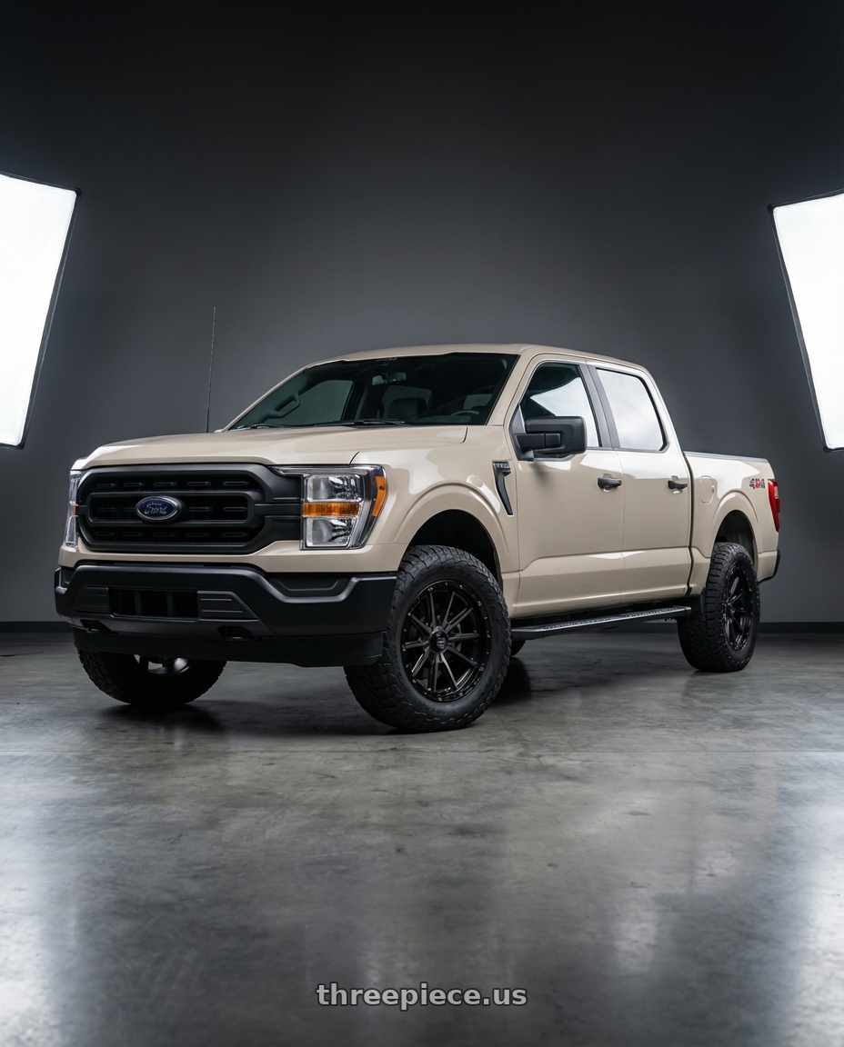 2013 Ford F-150 with KMC KM100 SYNC 6X135/6X139.7 20X9 +18 SATIN BLACK WITH GRAY TINT wheels front three quarter view stock stance