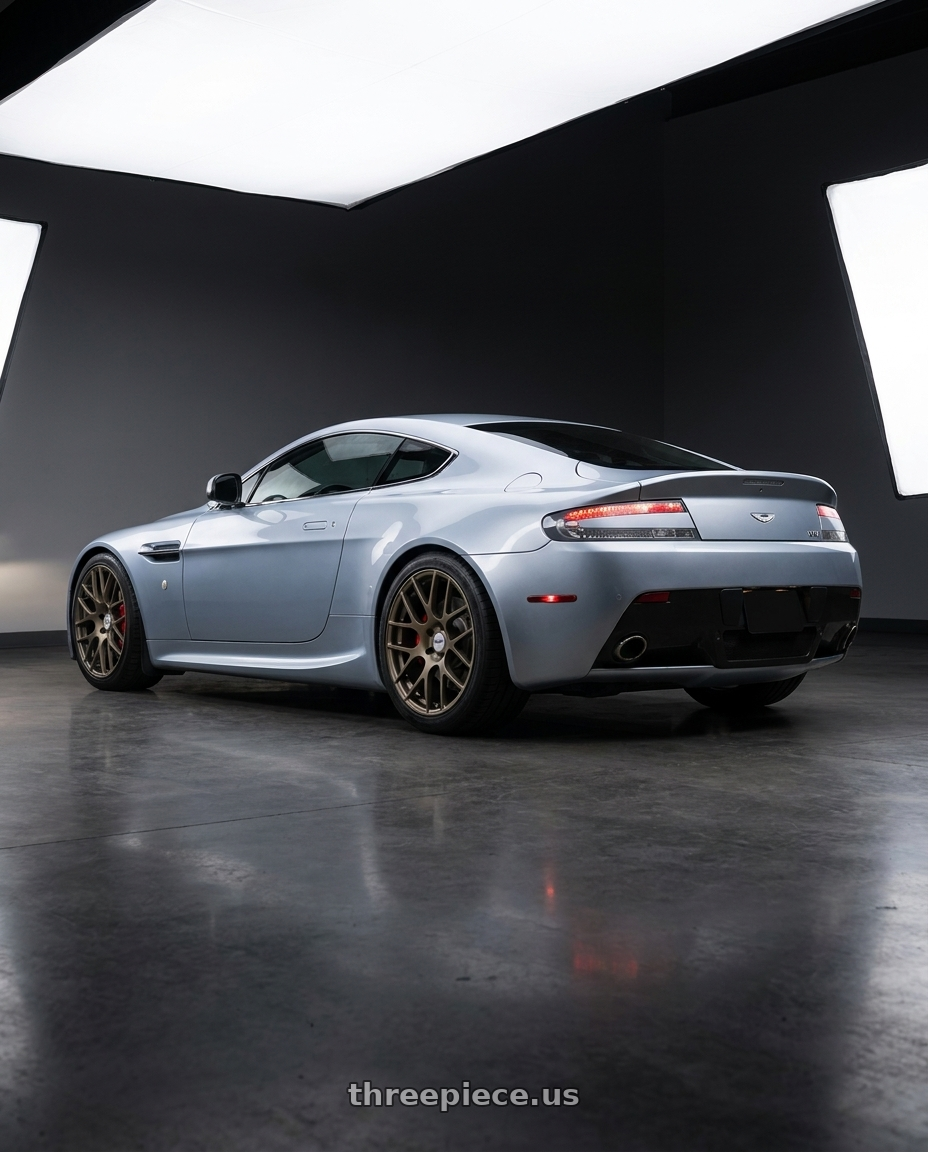 2011 Aston Martin V8 Vantage with TSW NURBURGRING 5X114.3 17X7.5 +45 MATTE BRONZE wheels rear three quarter view square tires