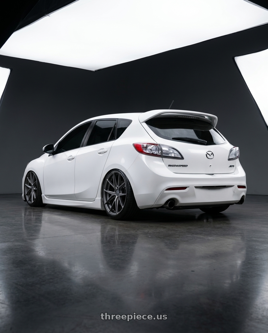 2012 Mazda Mazdaspeed3 with Niche 1PC M116 MISANO 5X114.3 18X9.5 +40 MATTE GUN METAL wheels rear three quarter view slight stretch tires