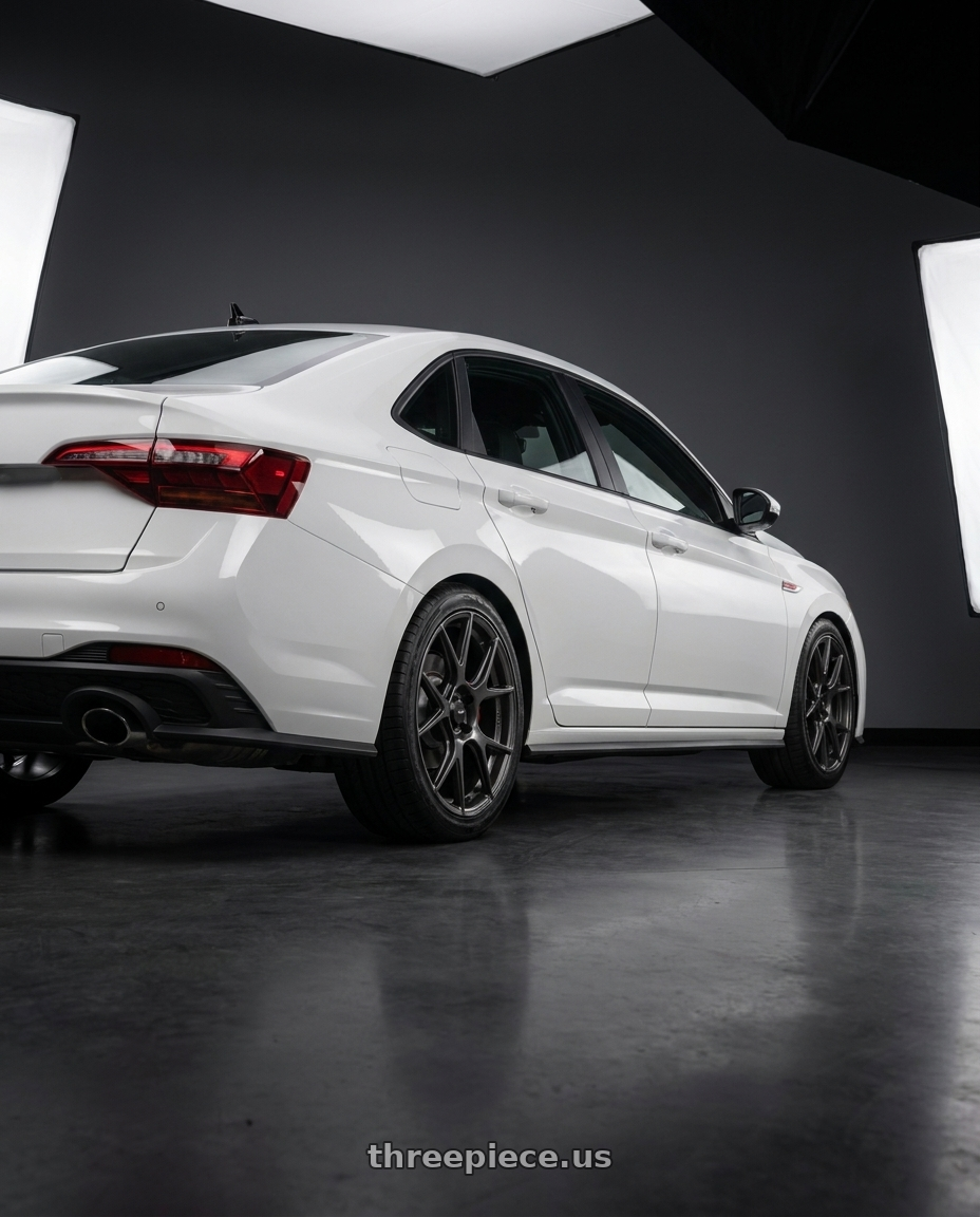 2024 Vw Gli with Konig Ampliform 5x115 18x9+15 Dark Metallic Graphite wheels rear three quarter view square tires
