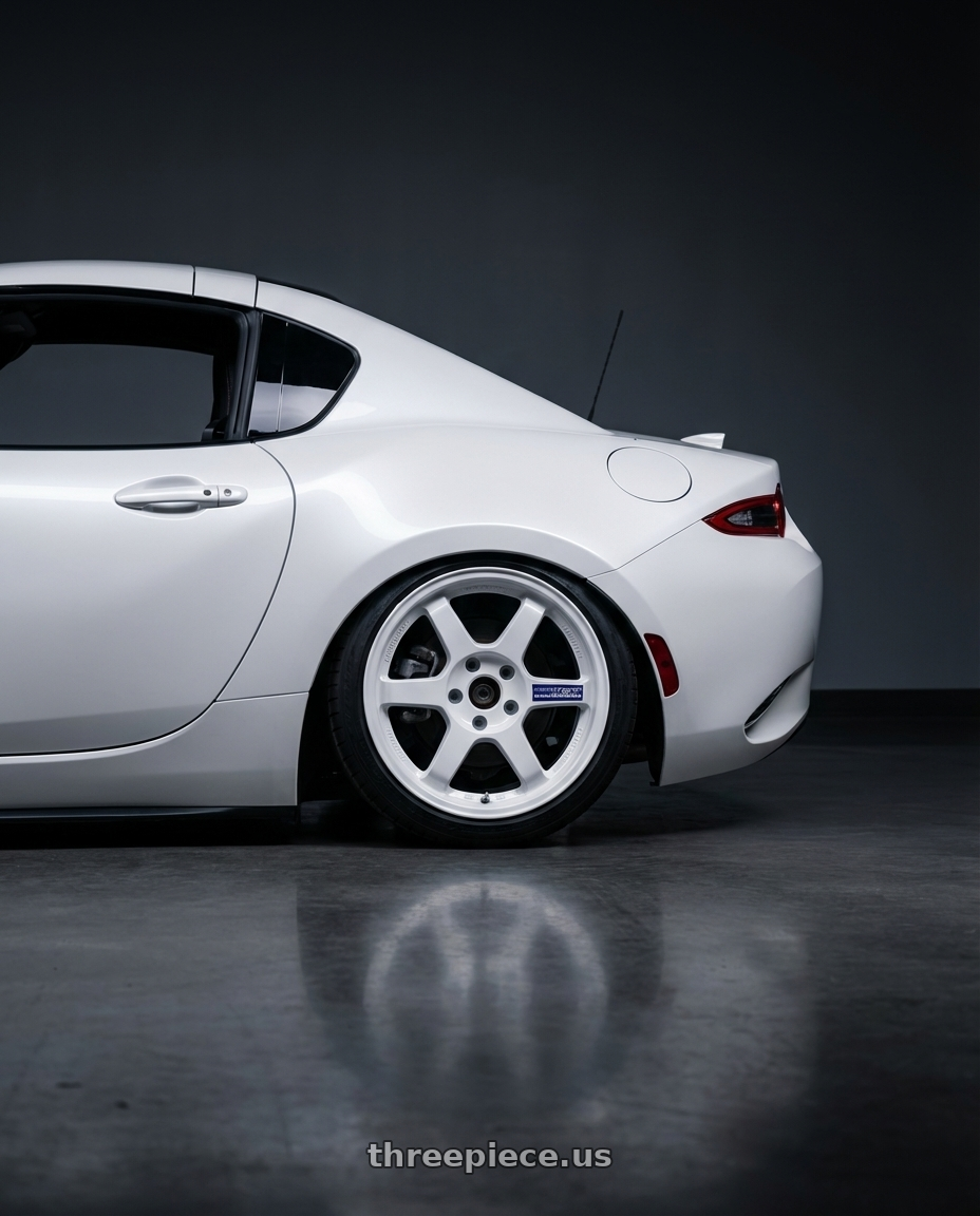 2025 Mazda miata  with Volk Racing TE37 Gravel 5x114.3 15x7.0+35 White wheels rear three quarter view slight stretch tires