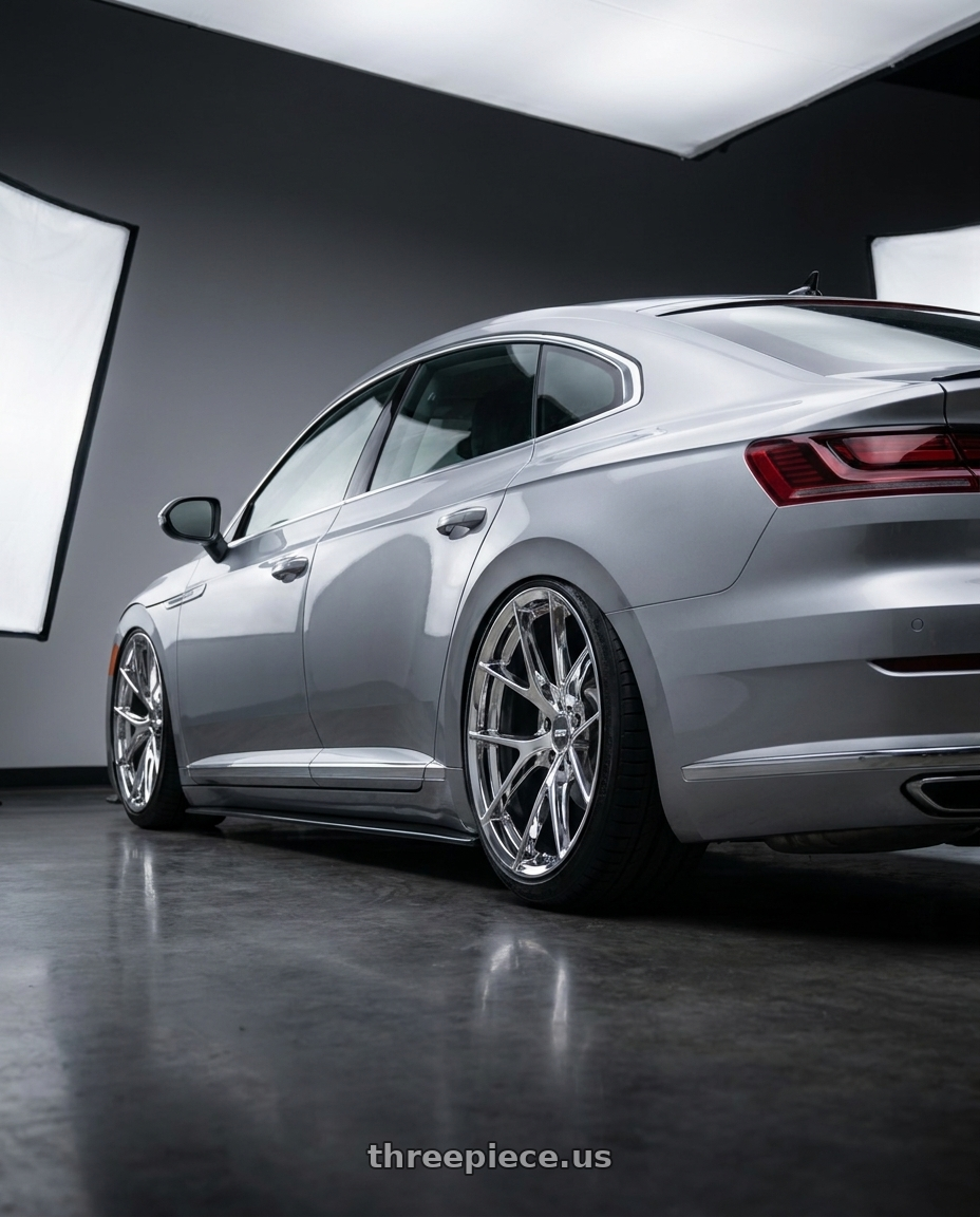 2020 Volkswagen Arteon with ESR Wheels RF2 5x112 19x9.5 +22 Chrome wheels rear three quarter view slight stretch tires