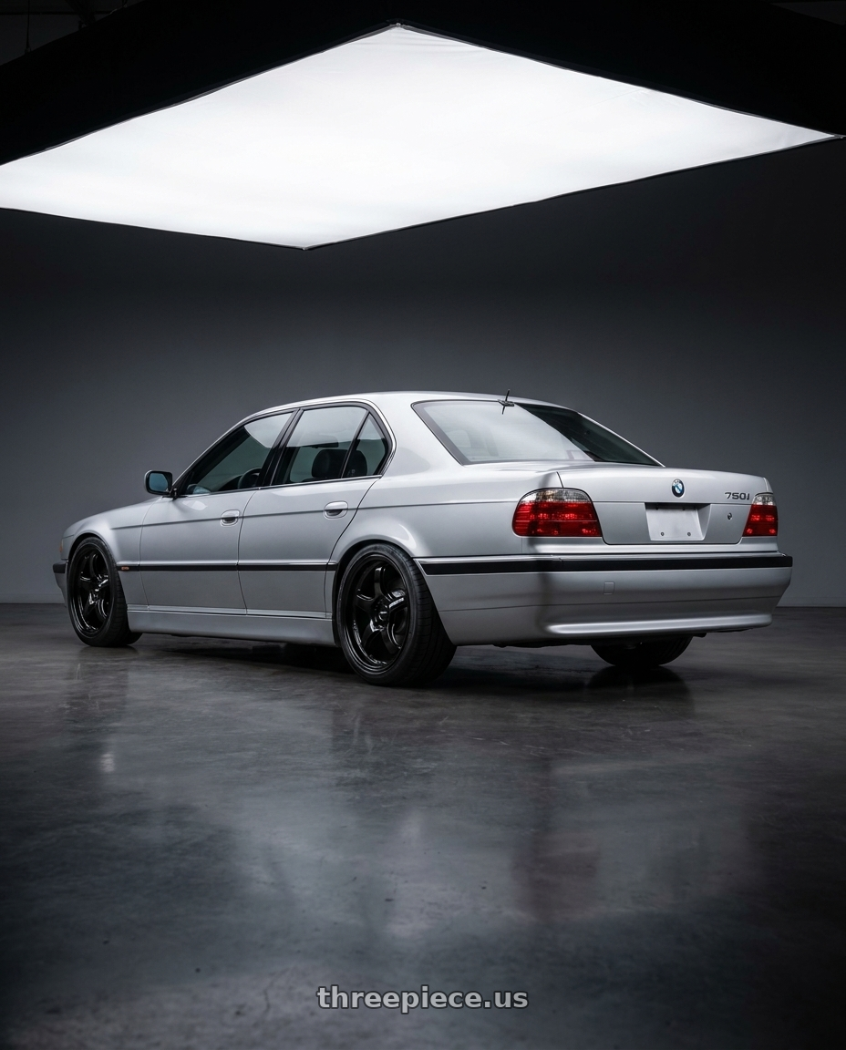1998 Bmw 750I with WedsSport RN-05M 5x120 18x8.5+36 Gloss Black wheels rear three quarter view square tires