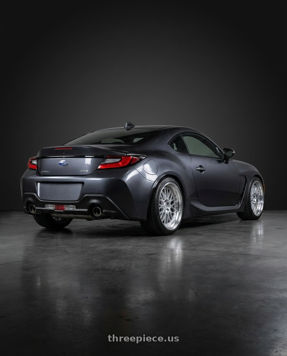 2023 Subaru BRZ premium with Aodhan AH02 5x100 18x9.5+35 Silver w/ Machined Lip wheels rear three quarter view square tires