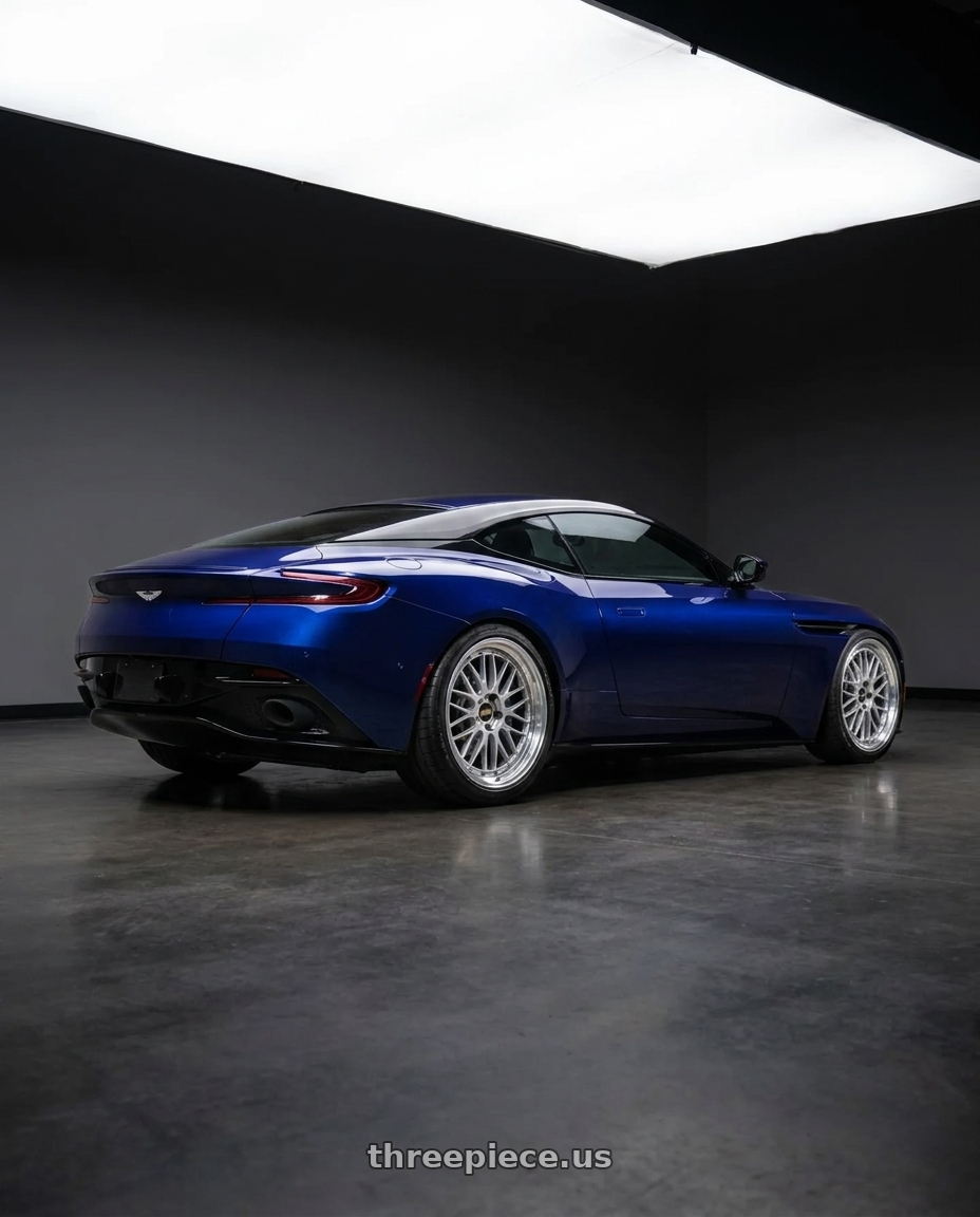 2019 Aston Martin DB11 with BBS LM 5x114.3 18x8.0+35 Diamond Silver wheels rear three quarter view slight stretch tires