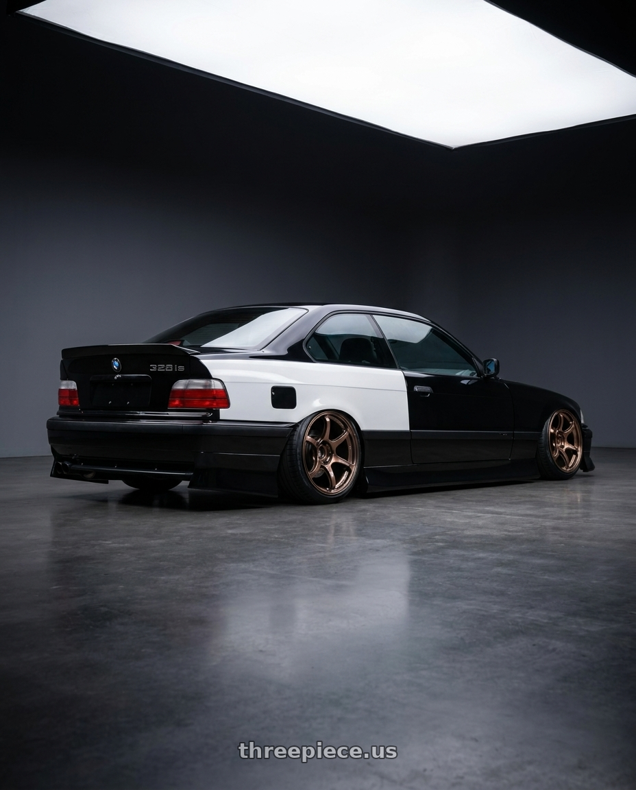1998 bmw 328is blakc with Advan Racing RG-4 5x114.3 17x10.0 +35 RACING COPPER BRONZE wheels rear three quarter view slight stretch tires