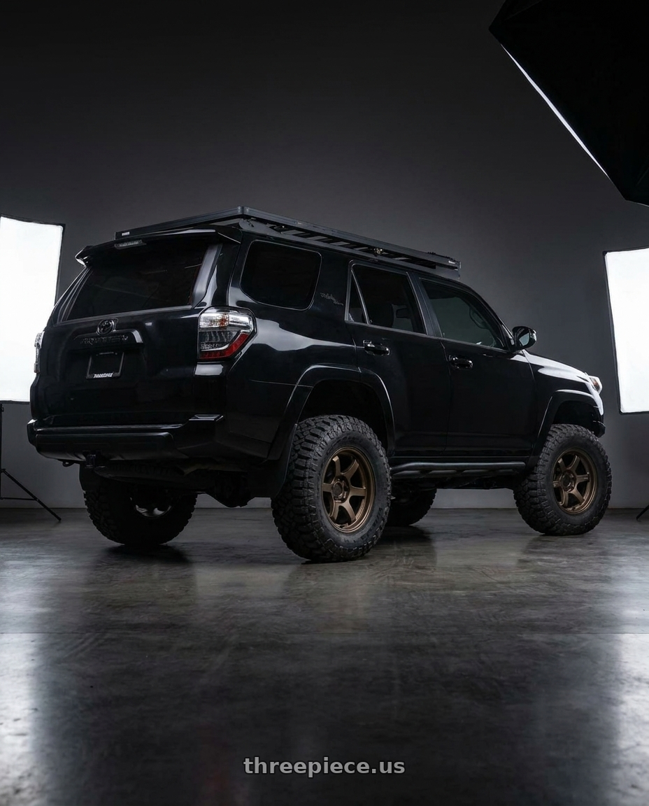 2017 Toyota 4Runner with Gram Lights 57DR-X 6x139.7 18x9 +0 DARK BRONZE wheels rear three quarter view meaty tires