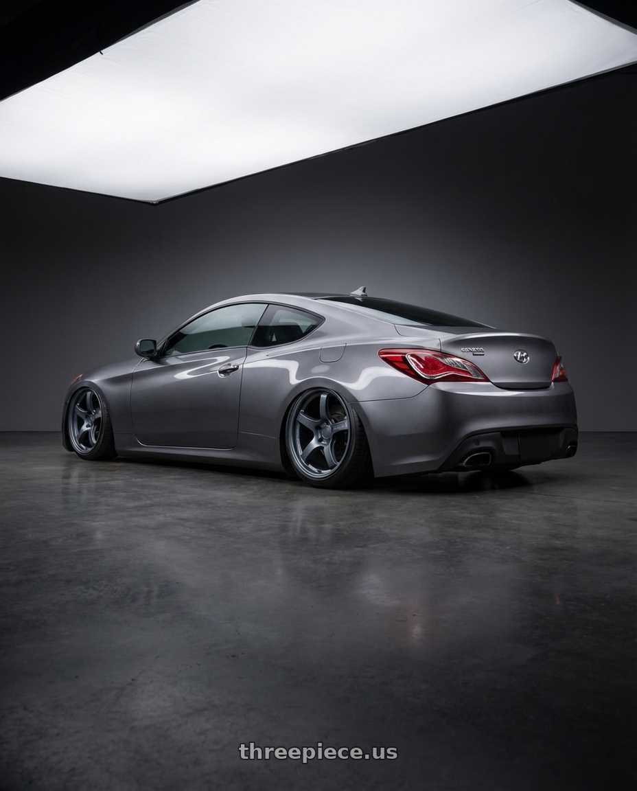 2014 Hyundai Genesis Coupe with Gram Lights 57CR 5x114.3 19x9.5+35 Gunblue II wheels rear three quarter view slight stretch tires
