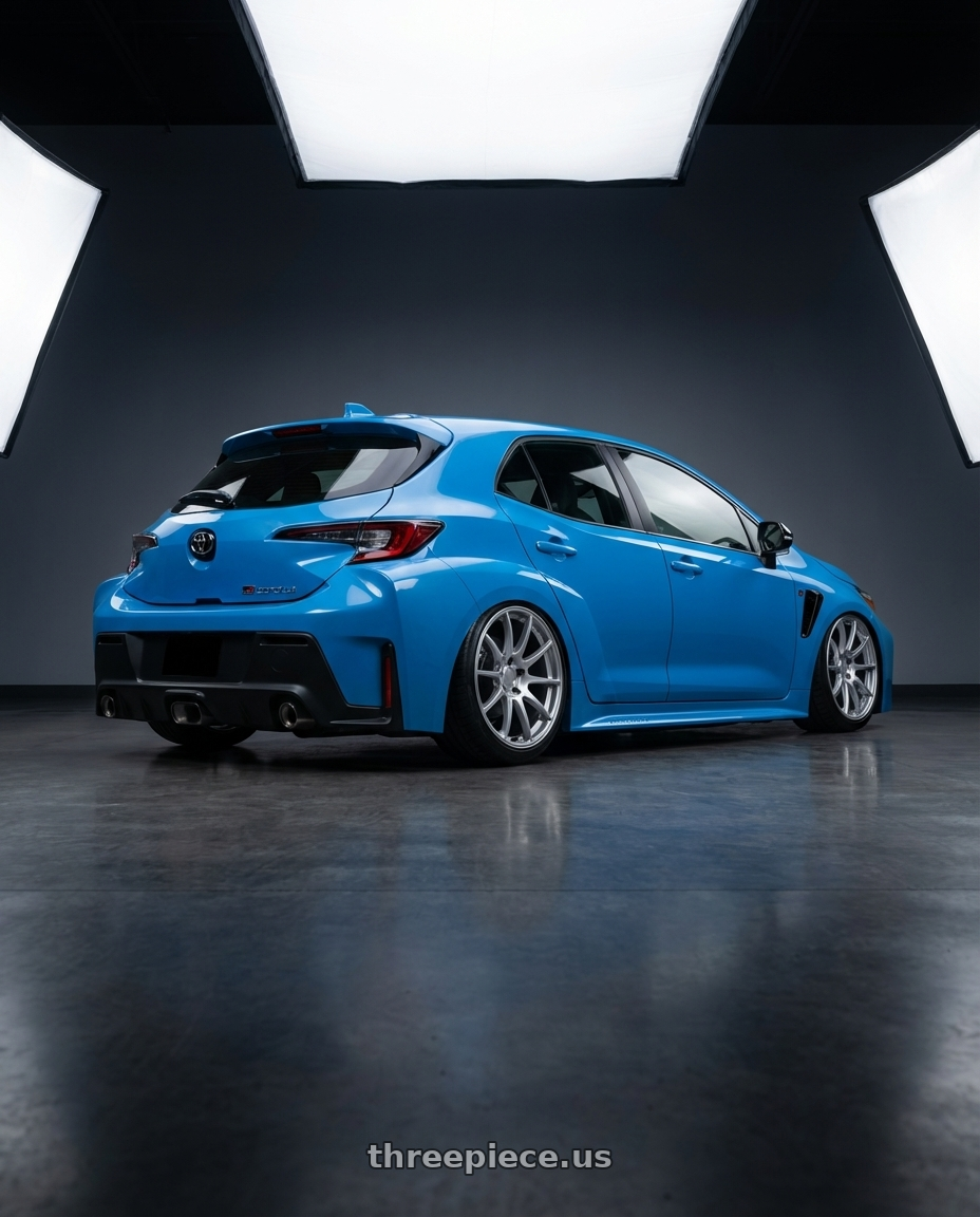 2024 Toyota GR Corolla with Ssr Gtv02 5x114.3 18x8.5+40  GLARE SILVER wheels rear three quarter view slight stretch tires