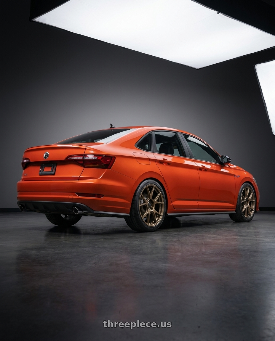 2023 Volkswagen Jetta GLI MK7 with Konig Ampliform 5x112 18x8.5+43 Gloss Bronze wheels rear three quarter view square tires