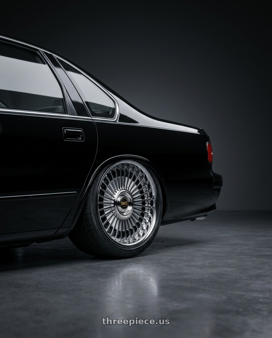1996 Chevy impala ss with Work Emitz Black Polish 5x100 19x9.0 +12 wheels rear three quarter view slight stretch tires