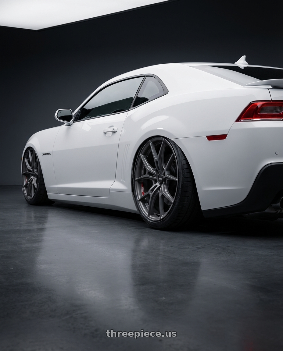 2014 Chevrolet Camaro 5th Gen with Gram Lights 57FXZ Overseas Model 5x120 20x10.5+25 Matte Graphite wheels rear three quarter view slight stretch tires