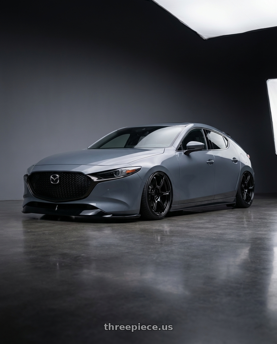 2023 Mazda Mazda3 Turbo with Advan RGIII 5x114.3 18x10.5+25 Gloss Black wheels front three quarter view stanced stance