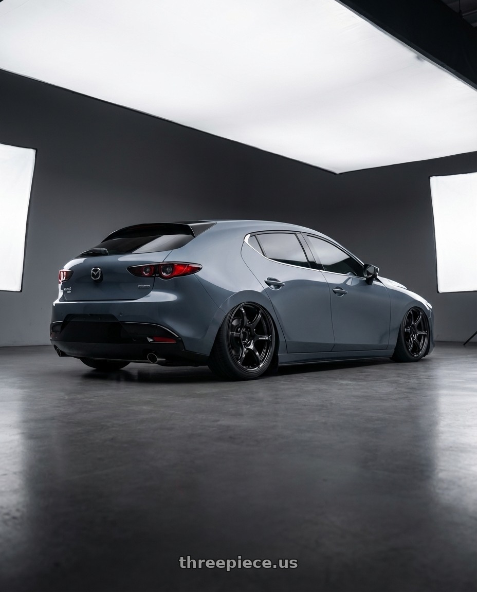 2023 Mazda Mazda3 Turbo with Advan RGIII 5x114.3 18x10.5+25 Gloss Black wheels rear three quarter view slight stretch tires