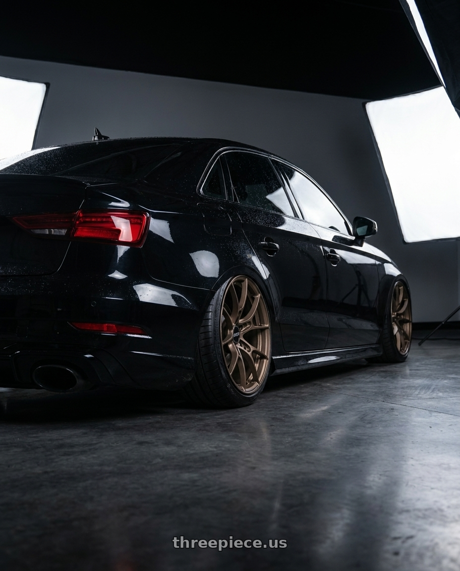 2017 Audi RS3 with Volk Racing G025 5x112 19x9.5+44 Matte Gunbronze wheels rear three quarter view extreme stretch tires