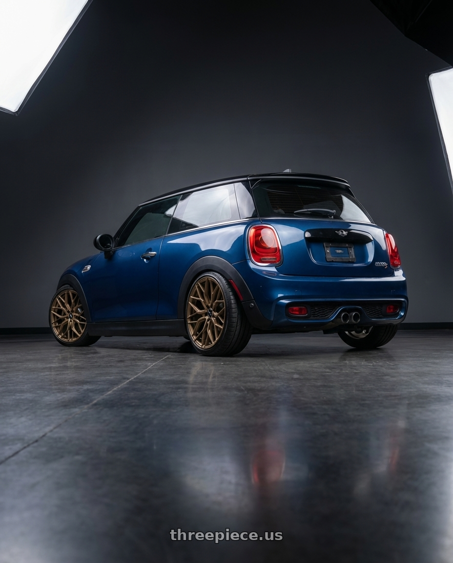 2016 Mini Cooper S Blue with F1R FS3 5x112 18x8.5 +35 Matte Bronze wheels rear three quarter view square tires