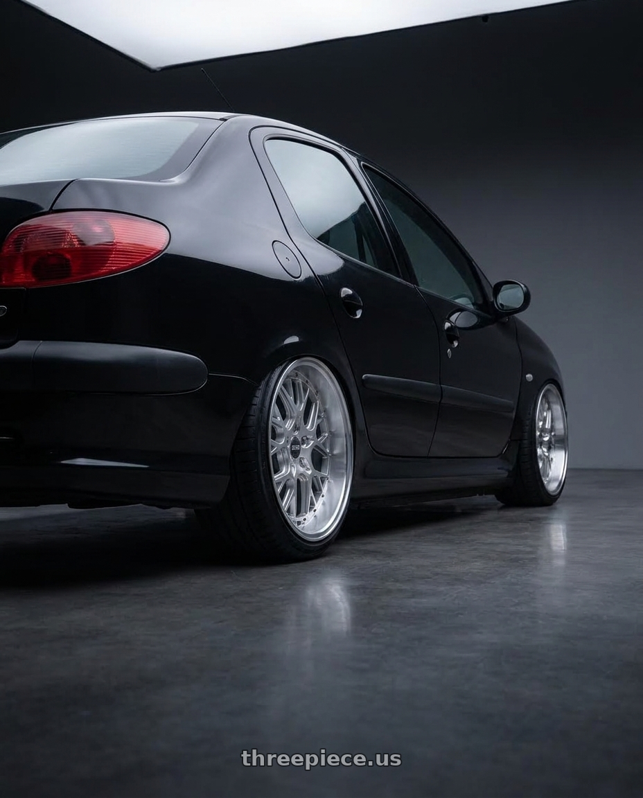 2011 Peugeot 206 SD with ESR Wheels CS SERIES CS11 5x100 18x8.5 +30 Hyper Silver wheels rear three quarter view slight stretch tires