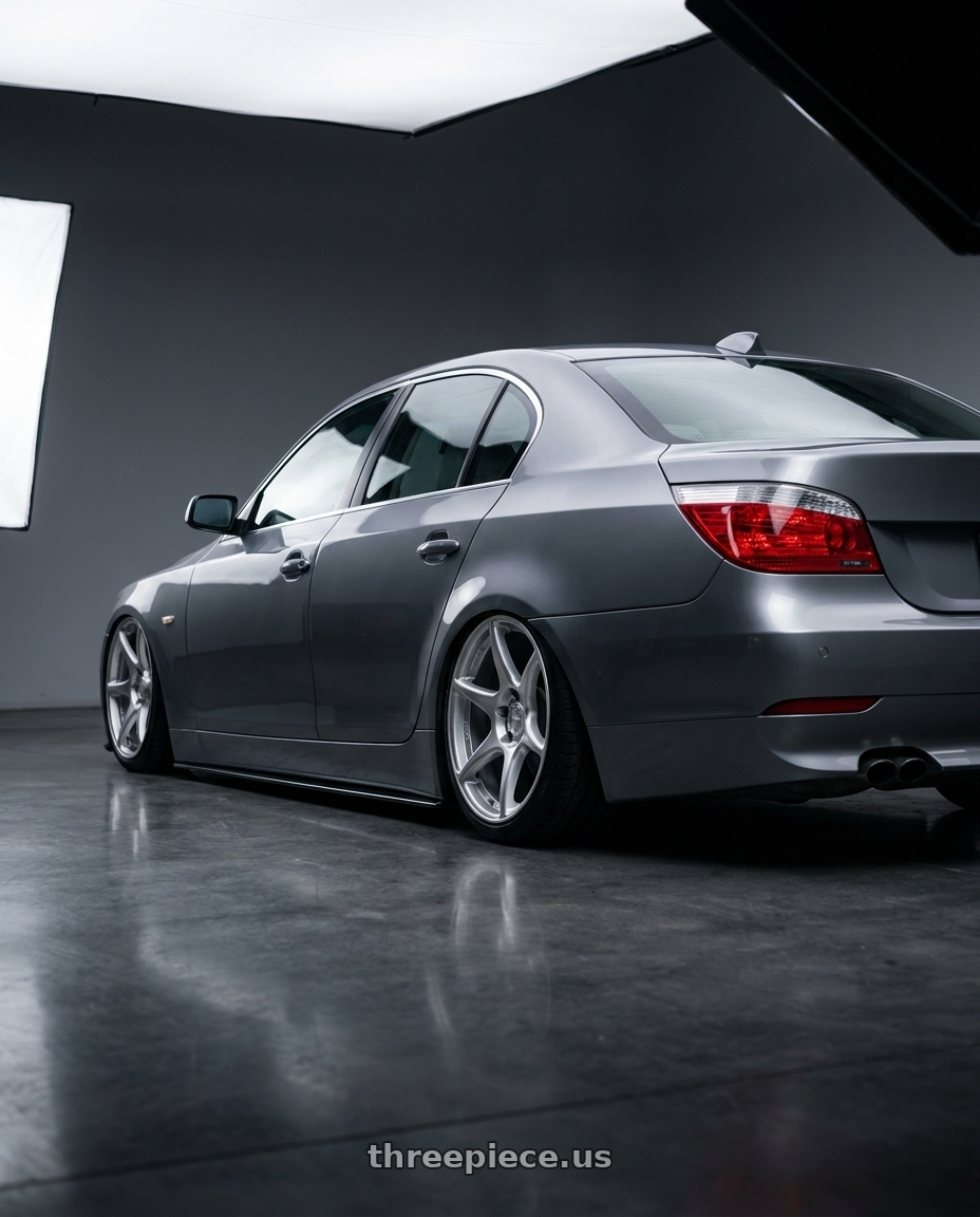 2004 Bmw E60 with Kansei K11S Tandem 5X120 19x9.5 22 Hyper Silver wheels rear three quarter view slight stretch tires