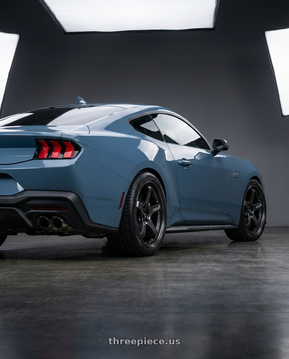 2024 ford mustang GT with Advan Racing GT for PORSCHE 5x130 18x8.5 +50 RACING TITANIUM BLACK wheels rear three quarter view square tires