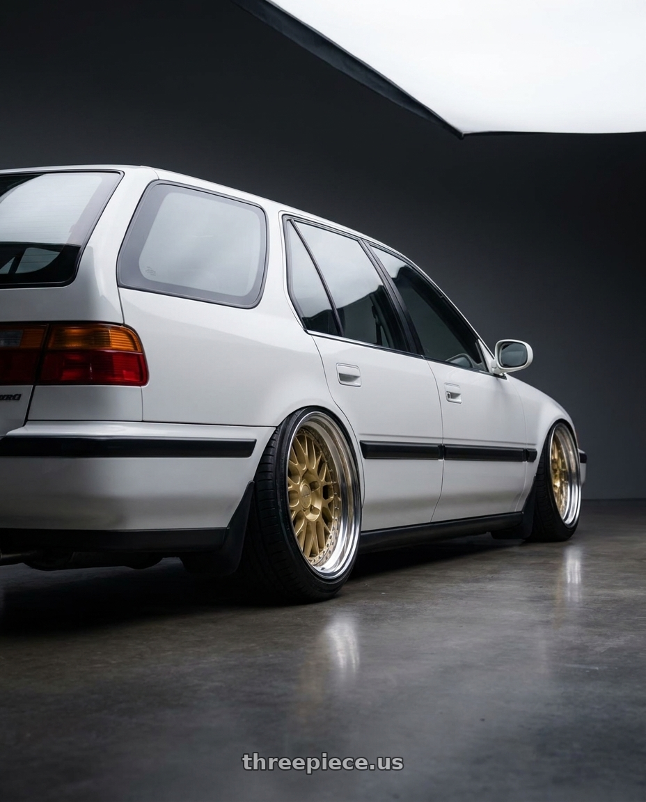 1993 Honda Accord wagon with Work Brombacher Mesh wheels rear three quarter view slight stretch tires